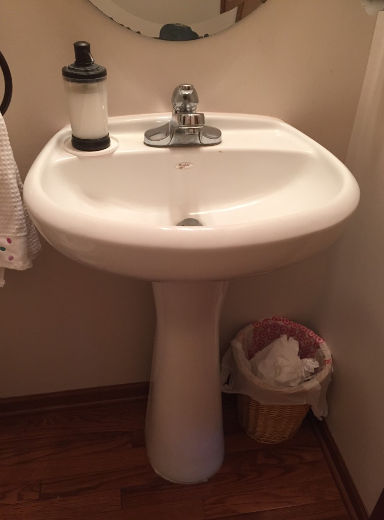 Powder Room Before Makeover: View of pedestal sink